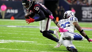 Oct 16, 2016; Houston, TX, USA; Houston Texans wide receiver DeAndre Hopkins (10) is tackled by Indianapolis Colts strong safety Clayton Geathers (26) after a pass reception during the second quarter at NRG Stadium. Mandatory Credit: Erik Williams-USA TODAY Sports