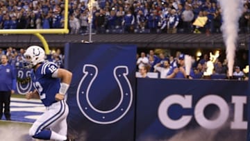 Dec 11, 2016; Indianapolis, IN, USA; Indianapolis Colts quarterback Andrew Luck (12) runs onto the field before the game against the Houston Texans at Lucas Oil Stadium. Mandatory Credit: Brian Spurlock-USA TODAY Sports