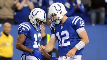 Dec 11, 2016; Indianapolis, IN, USA; Indianapolis Colts receiver T.Y. Hilton (13) and quarterback Andrew Luck (12) celebrate a second half touchdown against the Houston Texans at Lucas Oil Stadium. Mandatory Credit: Thomas J. Russo-USA TODAY Sports