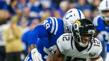 INDIANAPOLIS, IN - NOVEMBER 17: Dede Westbrook #12 of the Jacksonville Jaguars is tackled after making a catch in the third quarter of the game against the Indianapolis Colts at Lucas Oil Stadium on November 17, 2019 in Indianapolis, Indiana. (Photo by Bobby Ellis/Getty Images)