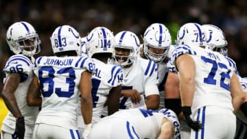 NEW ORLEANS, LOUISIANA - DECEMBER 16: Quarterback Jacoby Brissett #7 of the Indianapolis Colts call a play in the huddle during the game against the New Orleans Saints at Mercedes Benz Superdome on December 16, 2019 in New Orleans, Louisiana. (Photo by Jonathan Bachman/Getty Images)