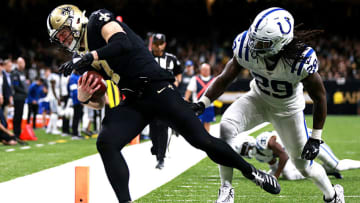 NEW ORLEANS, LOUISIANA - DECEMBER 16: Taysom Hill #7 of the New Orleans Saints scores a touchdown over free safety Malik Hooker #29 of the Indianapolis Colts in the third quarter of the game at Mercedes Benz Superdome on December 16, 2019 in New Orleans, Louisiana. (Photo by Sean Gardner/Getty Images)