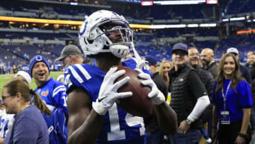 INDIANAPOLIS, INDIANA - DECEMBER 22: Zach Pascal #14 of the Indianapolis Colts throws a pass to a fan during warmups before the game against the Carolina Panthers at Lucas Oil Stadium on December 22, 2019 in Indianapolis, Indiana. (Photo by Justin Casterline/Getty Images)