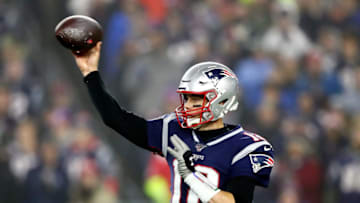 FOXBOROUGH, MASSACHUSETTS - JANUARY 04: Tom Brady #12 of the New England Patriots throws a pass in the AFC Wild Card Playoff game against the Tennessee Titans at Gillette Stadium on January 04, 2020 in Foxborough, Massachusetts. (Photo by Adam Glanzman/Getty Images)