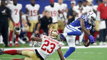 INDIANAPOLIS, IN - AUGUST 25: T.Y. Hilton #13 of the Indianapolis Colts drops a pass while defended by Ahkello Witherspoon #23 of the San Francisco 49ers in the first quarter of a preseason game at Lucas Oil Stadium on August 25, 2018 in Indianapolis, Indiana. (Photo by Joe Robbins/Getty Images)