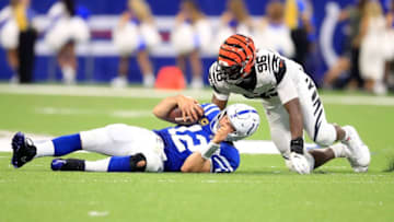 INDIANAPOLIS, IN - SEPTEMBER 09: Andrew Luck #12 of the Indianapolis Colts is sacked by Carlos Dunlap #96 of the Cincinnati Bengals at Lucas Oil Stadium on September 9, 2018 in Indianapolis, Indiana. (Photo by Andy Lyons/Getty Images)
