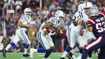 FOXBOROUGH, MA - OCTOBER 04: Jordan Wilkins #20 of the Indianapolis Colts runs with the ball during the first half against the New England Patriots at Gillette Stadium on October 4, 2018 in Foxborough, Massachusetts. (Photo by Adam Glanzman/Getty Images)