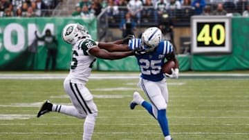 EAST RUTHERFORD, NJ - OCTOBER 14: Running back Marlon Mack #25 of the Indianapolis Colts runs the ball against free safety Marcus Maye #26 of the New York Jets during the third quarter at MetLife Stadium on October 14, 2018 in East Rutherford, New Jersey. (Photo by Jeff Zelevansky/Getty Images)
