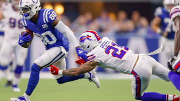 INDIANAPOLIS, IN - OCTOBER 21: Chester Rogers #80 of the Indianapolis Colts runs the ball as Jordan Poyer #21 of the Buffalo Bills reaches for the stop at Lucas Oil Stadium on October 21, 2018 in Indianapolis, Indiana. (Photo by Michael Hickey/Getty Images)