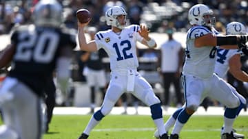 OAKLAND, CA - OCTOBER 28: Andrew Luck #12 of the Indianapolis Colts looks to pass against the Oakland Raiders during the first quarter of their NFL football game at Oakland-Alameda County Coliseum on October 28, 2018 in Oakland, California. (Photo by Thearon W. Henderson/Getty Images)