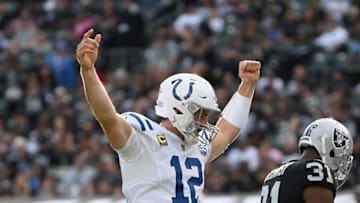 OAKLAND, CA - OCTOBER 28: Andrew Luck #12 of the Indianapolis Colts signals touchdown after Marlon Mack #25 scores on a one yard run against the Oakland Raiders during the second half of their NFL football game at Oakland-Alameda County Coliseum on October 28, 2018 in Oakland, California. (Photo by Thearon W. Henderson/Getty Images)