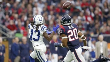 HOUSTON, TX - DECEMBER 09: T.Y. Hilton #13 of the Indianapolis Colts catches a pass in the second quarter defended by Justin Reid #20 of the Houston Texans at NRG Stadium on December 9, 2018 in Houston, Texas. (Photo by Tim Warner/Getty Images)