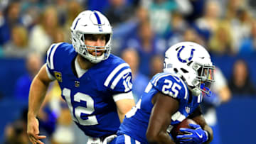 INDIANAPOLIS, INDIANA - NOVEMBER 25: Andrew Luck #12 of the Indianapolis Colts hands the ball off to Marlon Mack #25 in the game against Miami Dolphins in the second quarter at Lucas Oil Stadium on November 25, 2018 in Indianapolis, Indiana. (Photo by Stacy Revere/Getty Images)