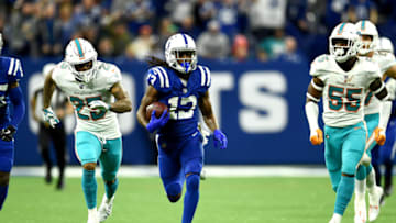 INDIANAPOLIS, INDIANA - NOVEMBER 25: T.Y. Hilton #13 of the Indianapolis Colts runs after a catch in the game against Miami Dolphins in the fourth quarter at Lucas Oil Stadium on November 25, 2018 in Indianapolis, Indiana. (Photo by Stacy Revere/Getty Images)
