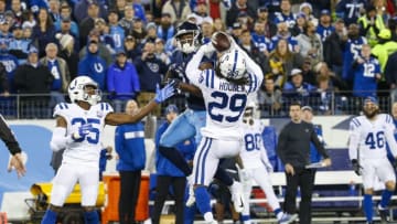 NASHVILLE, TN - DECEMBER 30: Malik Hooker #29 of the Indianapolis Colts reaches for the ball while in the air with Corey Davis #84 of the Tennessee Titans during the second quarter at Nissan Stadium on December 30, 2018 in Nashville, Tennessee. (Photo by Frederick Breedon/Getty Images)