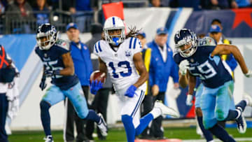 NASHVILLE, TN - DECEMBER 30: T.Y. Hilton #13 of the Indianapolis Colts runs with the ball while defended by Wesley Woodyard #59 of the Tennessee Titans during the second quarter at Nissan Stadium on December 30, 2018 in Nashville, Tennessee. (Photo by Frederick Breedon/Getty Images)