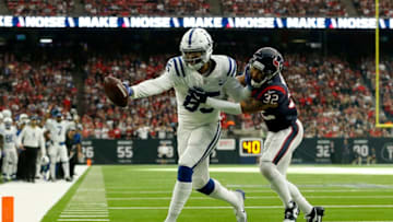 HOUSTON, TX - JANUARY 05: Eric Ebron #85 of the Indianapolis Colts catches a pass for a touchdown defended by Tyrann Mathieu #32 of the Houston Texans in the first quarter during the Wild Card Round at NRG Stadium on January 5, 2019 in Houston, Texas. (Photo by Tim Warner/Getty Images)