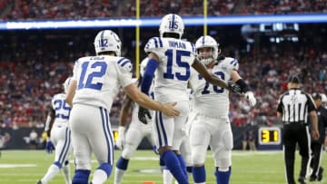HOUSTON, TX - JANUARY 05: Andrew Luck #12 of the Indianapolis Colts congratulates Dontrelle Inman #15 after a second quarter touchdown during the Wild Card Round at NRG Stadium on January 5, 2019 in Houston, Texas. (Photo by Tim Warner/Getty Images)