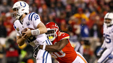 KANSAS CITY, MO - JANUARY 12: Andrew Luck #12 of the Indianapolis Colts is sacked by Justin Houston #50 of the Kansas City Chiefs during the third quarter of the AFC Divisional Round playoff game at Arrowhead Stadium on January 12, 2019 in Kansas City, Missouri. (Photo by Jamie Squire/Getty Images)