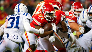 KANSAS CITY, MO - JANUARY 12: Running back Darrel Williams #31 of the Kansas City Chiefs scores on a six-yard touchdown run past cornerback Quincy Wilson #31 of the Indianapolis Colts late in the fourth quarter during the AFC Divisional Playoff at Arrowhead Stadium on January 12, 2019 in Kansas City, Missouri. (Photo by David Eulitt/Getty Images)