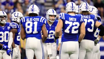 INDIANAPOLIS, INDIANA - DECEMBER 23: Andrew Luck #12 of the Indianapolis Colts talks to his team in a huddle in the game against the New York Giants in the fourth quarter at Lucas Oil Stadium on December 23, 2018 in Indianapolis, Indiana. (Photo by Andy Lyons/Getty Images)