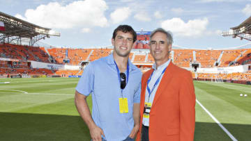 HOUSTON, TX - MAY 12: Former Dynamo President Oliver Luck (R) and his son Andrew Luck, first round pick in the NFL by the Indianapolis Colts during pre-game activity at the inaugural opening at BBVA Compass Stadium on May 12, 2012 in Houston, Texas. (Photo by Bob Levey/Getty Images)