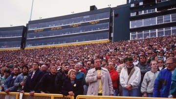 25 Oct 1992: FANS AT LAMBEAU FIELD, HOME OF THE GREEN BAY PACKERS, STAND FOR THE NATIOANL ANTHEM PRIOR TO THE PACKERS GAME WITH THE CHICAGO BEARS.