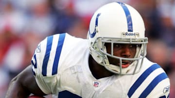 HOUSTON - DECEMBER 12: Edgerrin James #32 of the Indianapolis Colts carries the ball against the Houston Texans December 12, 2004 at Reliant Stadium in Houston, Texas. (Photo by Matthew Stockman/Getty Images)