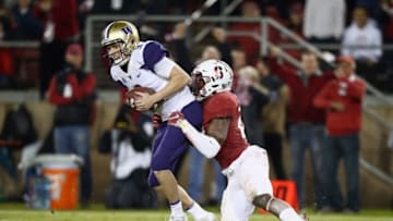 PALO ALTO, CA - NOVEMBER 10: Bobby Okereke #20 of the Stanford Cardinal sacks Jake Browning #3 of the Washington Huskies at Stanford Stadium on November 10, 2017 in Palo Alto, California. (Photo by Ezra Shaw/Getty Images)