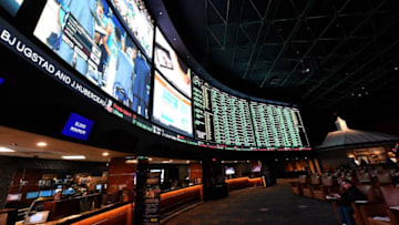 LAS VEGAS, NV - FEBRUARY 02: The betting line and some of the nearly 400 proposition bets for Super Bowl 50 between the Carolina Panthers and the Denver Broncos are displayed at the Race