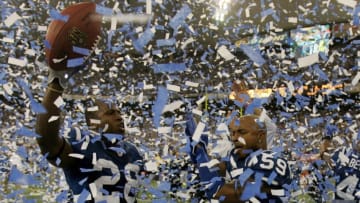 INDIANAPOLIS - JANUARY 21: Marlin Jackson #28 and Cato June #59 of the Indianapolis Colts celebrate amongst confetti after their team defeated the New England Patriots 38-34 in the AFC Championship Game on January 21, 2007 at the RCA Dome in Indianapolis, Indiana. (Photo by Andy Lyons/Getty Images)