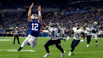 INDIANAPOLIS, INDIANA - NOVEMBER 18: Andrew Luck #12 of the Indianapolis Colts dives for a catch in the game against the Tennessee Titans in the second quarter at Lucas Oil Stadium on November 18, 2018 in Indianapolis, Indiana. (Photo by Bobby Ellis/Getty Images)