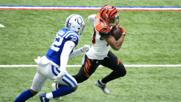 INDIANAPOLIS, INDIANA - OCTOBER 18: Tyler Boyd #83 of the Cincinnati Bengals carries the ball against Julian Blackmon #32 of the Indianapolis Colts during the first half at Lucas Oil Stadium on October 18, 2020 in Indianapolis, Indiana. (Photo by Andy Lyons/Getty Images)