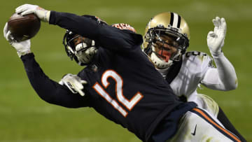 CHICAGO, ILLINOIS - NOVEMBER 01: Allen Robinson II #12 of the Chicago Bears makes a pass reception against Marshon Lattimore #23 of the New Orleans Saints in overtime at Soldier Field on November 01, 2020 in Chicago, Illinois. (Photo by Quinn Harris/Getty Images)