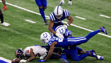 INDIANAPOLIS, INDIANA - DECEMBER 20: Keke Coutee #16 of the Houston Texans fumbles the ball near the end zone in the game against the Indianapolis Colts during the fourth quarter at Lucas Oil Stadium on December 20, 2020 in Indianapolis, Indiana. (Photo by Justin Casterline/Getty Images)