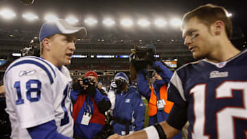 New England Patriots' Tom Brady, right, shakes hands with Indianapolis Colts' Peyton Manning after a game between New England Patriots and Indianapolis Colts at Gillette Stadium, Foxborough, Massachusetts, Sunday, November 5, 2006. Colts won 27-20. (Photo by Jim Rogash/Getty Images)