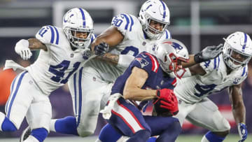 Indianapolis Colts safety Matthias Farley (41), defensive tackle Grover Stewart (90) and linebacker Zaire Franklin (44) surround New England Patriots wide receiver Julian Edelman (11) in the third quarter at Gillette Stadium in Foxborough, Mass., Thursday, Oct. 4, 2018.
Indianapolis Colts Versus New England Patriots At Gillette Stadium In Foxborough Mass Thursday Oct 4 2018