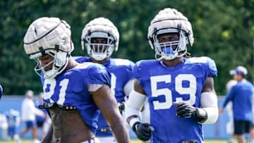 From left, The Indianapolis Colts Yannick Ngakoue (91), Eric Johnson (93), and Ifeadi Odenigbo (59) run drills during Colts Camp on Monday, August 8, 2022, at Grand Park in Westfield Ind.