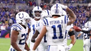 Oct 11, 2021; Baltimore, Maryland, USA; Indianapolis Colts wide receiver Michael Pittman (11) celebrates with teammates after scoring a touchdown against the Indianapolis Colts at M&T Bank Stadium. Mandatory Credit: Geoff Burke-USA TODAY Sports