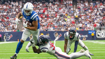 Sep 11, 2022; Houston, Texas, USA; Indianapolis Colts wide receiver Michael Pittman Jr. (11) scores a touchdown against Houston Texans Houston Texans safety Jonathan Owens (36) in the fourth quarter at NRG Stadium. Mandatory Credit: Thomas Shea-USA TODAY Sports