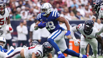 Sep 11, 2022; Houston, Texas, USA; Indianapolis Colts running back Jonathan Taylor (28) runs with the ball during the fourth quarter against the Houston Texans at NRG Stadium. Mandatory Credit: Troy Taormina-USA TODAY Sports