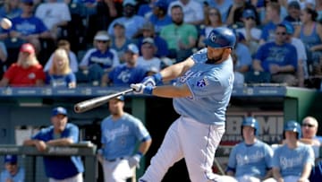 Sep 18, 2016; Kansas City, MO, USA; Kansas City Royals designated hitter Kendrys Morales (25) hits a two run home run in the sixth inning against the Chicago White Sox at Kauffman Stadium. Mandatory Credit: Denny Medley-USA TODAY Sports