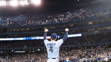 TORONTO, ONTARIO - OCTOBER 3: George Springer #4 of the Toronto Blue Jays salutes the crowd after defeating the Baltimore Orioles in their MLB game at the Rogers Centre on October 3, 2021 in Toronto, Ontario, Canada. (Photo by Mark Blinch/Getty Images)