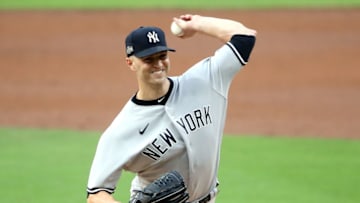 SAN DIEGO, CALIFORNIA - OCTOBER 06: J.A. Happ #33 of the New York Yankees delivers the pitch against the Tampa Bay Rays during the second inning in Game Two of the American League Division Series at PETCO Park on October 06, 2020 in San Diego, California. (Photo by Sean M. Haffey/Getty Images)