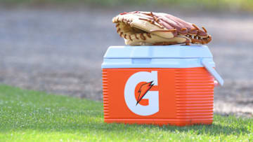 LAKELAND, FL - FEBRUARY 17: A detailed view of a Gatorade cooler and a baseball glove sitting on the field during the Detroit Tigers Spring Training workouts at the TigerTown Facility on February 17, 2020 in Lakeland, Florida. (Photo by Mark Cunningham/MLB Photos via Getty Images)