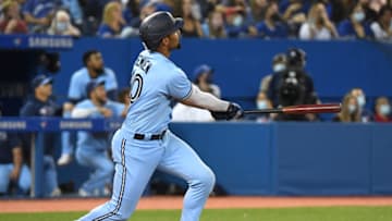 Oct 3, 2021; Toronto, Ontario, CAN; Toronto Blue Jays second baseman Marcus Semien (10) hits a solo home run against the Baltimore Orioles in the fifth inning at Rogers Centre. Mandatory Credit: Dan Hamilton-USA TODAY Sports