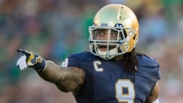 Sep 5, 2015; South Bend, IN, USA; Notre Dame Fighting Irish linebacker Jaylon Smith (9) signals in the first quarter against the Texas Longhorns at Notre Dame Stadium. Notre Dame won 38-3. Mandatory Credit: Matt Cashore-USA TODAY Sports