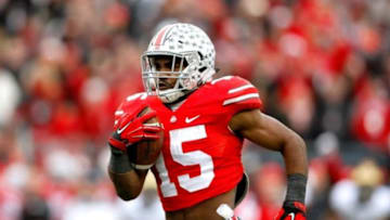 Nov 29, 2014; Columbus, OH, USA; Ohio State Buckeyes running back Ezekiel Elliott (15) breaks free for a touchdown versus the Michigan Wolverines during the second half of the Buckeyes 42-28 win at Ohio Stadium. Mandatory Credit: Joe Maiorana-USA TODAY Sports