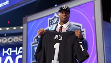 May 8, 2014; New York, NY, USA; Khalil Mack (Buffalo) holds up a jersey after being selected as the number five overall pick in the first round of the 2014 NFL Draft to the Oakland Raiders at Radio City Music Hall. Mandatory Credit: Adam Hunger-USA TODAY Sports