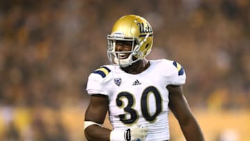 Sep 25, 2014; Tempe, AZ, USA; UCLA Bruins linebacker Myles Jack (30) celebrates a play against the Arizona State Sun Devils at Sun Devil Stadium. UCLA defeated Arizona State 62-27. Mandatory Credit: Mark J. Rebilas-USA TODAY Sports